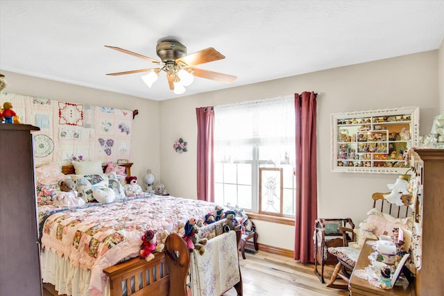 3538 E State Highway Aa, Springfield, MO 65803 - bedroom with light wood-style floors, baseboards, and a ceiling fan