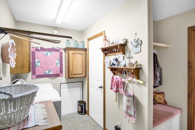 3538 E State Highway Aa, Springfield, MO 65803 - washroom featuring cabinet space and light tile patterned floors