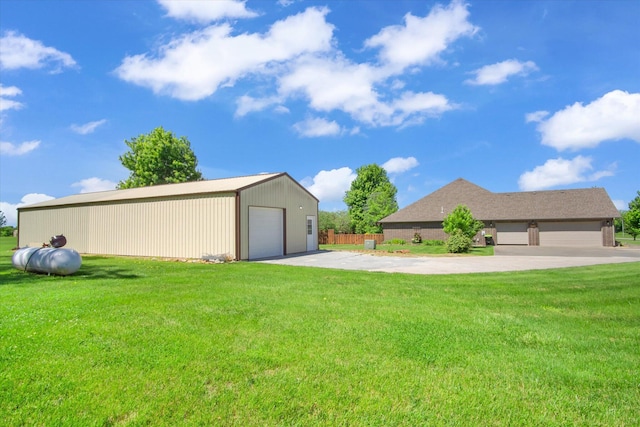 3538 E State Highway Aa, Springfield, MO 65803 - view of yard with a garage and an outdoor structure