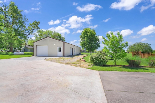 3538 E State Highway Aa, Springfield, MO 65803 - view of side of property featuring a detached garage, driveway, and an outbuilding