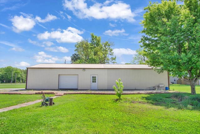 3538 E State Highway Aa, Springfield, MO 65803 - back of property featuring a lawn and an outbuilding