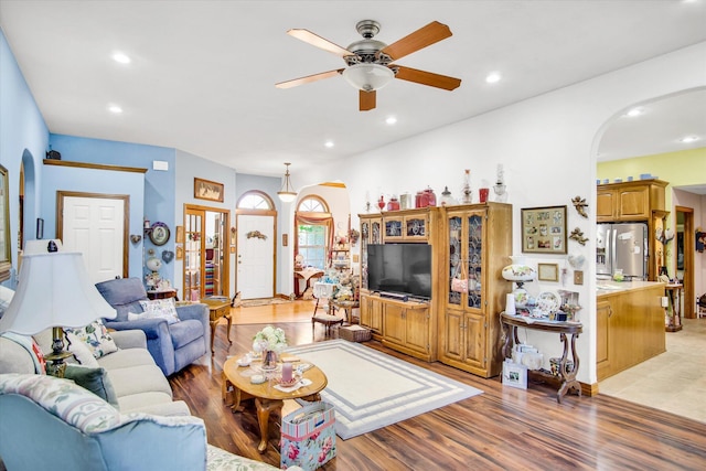 3538 E State Highway Aa, Springfield, MO 65803 - living room featuring arched walkways, ceiling fan, light wood-style floors, and recessed lighting