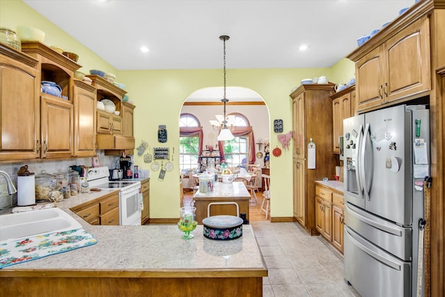 3538 E State Highway Aa, Springfield, MO 65803 - kitchen with stainless steel refrigerator with ice dispenser, white electric stove, a sink, light countertops, and recessed lighting