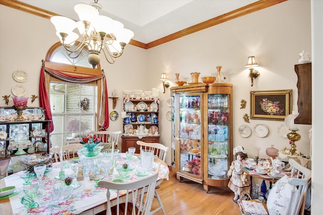 3538 E State Highway Aa, Springfield, MO 65803 - dining space with a chandelier, ornamental molding, and light wood-style floors