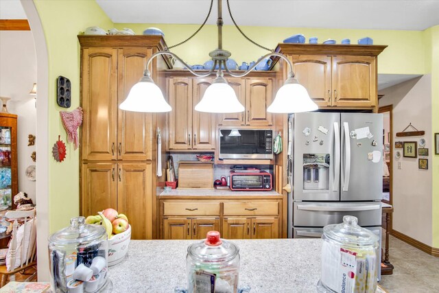 3538 E State Highway Aa, Springfield, MO 65803 - kitchen with stainless steel fridge with ice dispenser, light countertops, and arched walkways