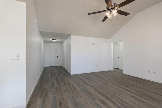 unfurnished living room featuring baseboards, ceiling fan, dark wood finished floors, and high vaulted ceiling
