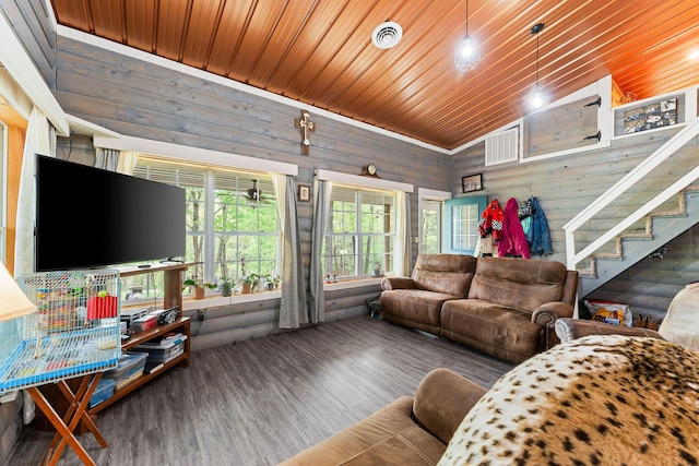 living room with stairs, wood ceiling, and wood finished floors