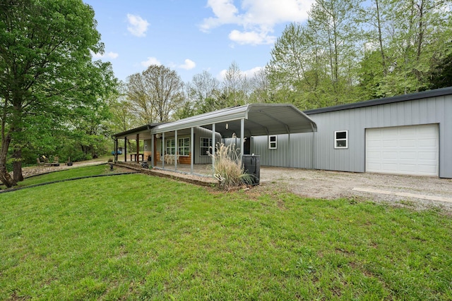 exterior space featuring dirt driveway and a carport