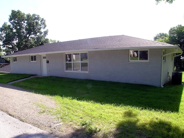 424 N Clay St, Marshfield, MO 65706 - back of property with a yard and brick siding