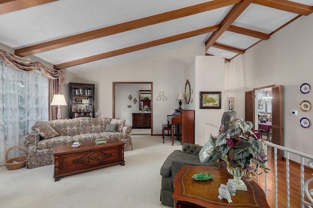 living area featuring carpet flooring and baseboards
