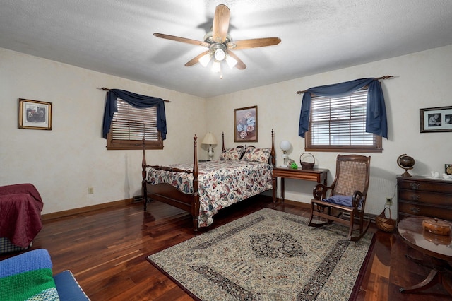 bedroom with wood finished floors, ceiling fan, and baseboards