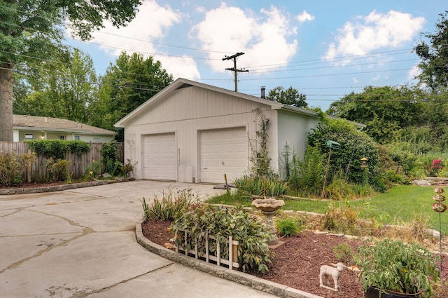 detached garage with fence