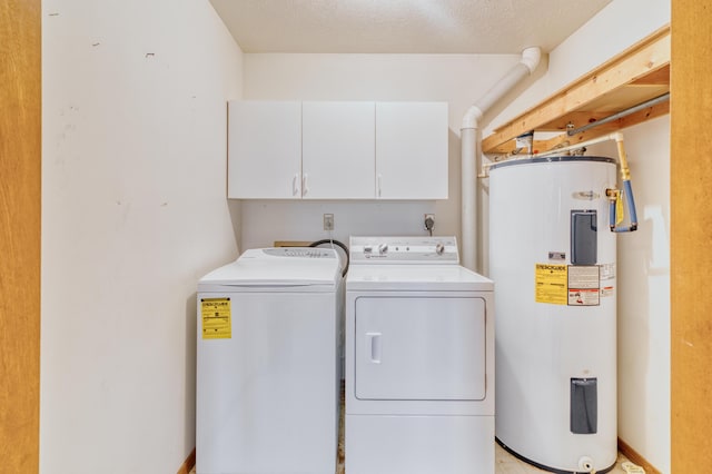 laundry room with water heater, cabinet space, and independent washer and dryer
