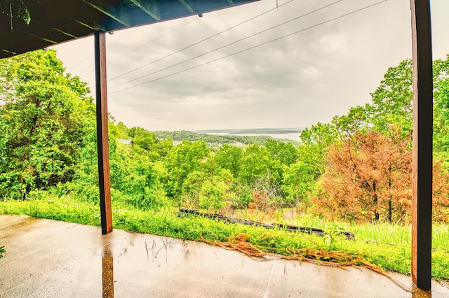 view of patio featuring a forest view