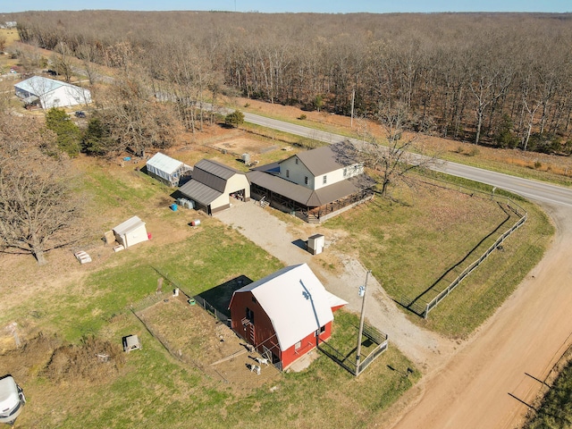 drone / aerial view with a view of trees