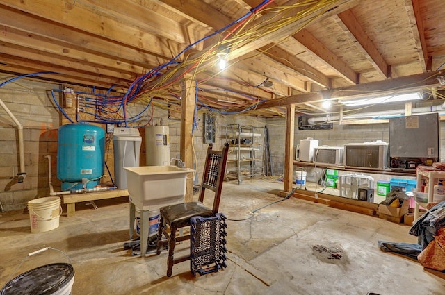 unfinished basement featuring water heater