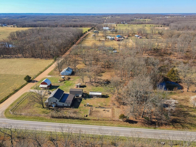 birds eye view of property featuring a rural view