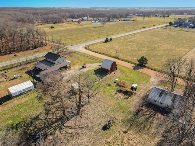 birds eye view of property featuring a rural view