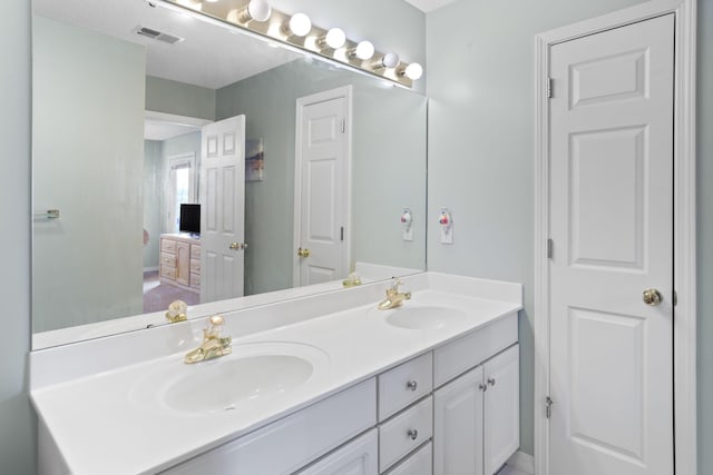 161 Avondale Dr Unit 11, Branson, MO 65616 - ensuite bathroom with a sink, ensuite bathroom, double vanity, and visible vents