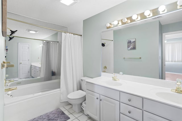 161 Avondale Dr Unit 11, Branson, MO 65616 - full bath with double vanity, visible vents, a sink, and tile patterned flooring