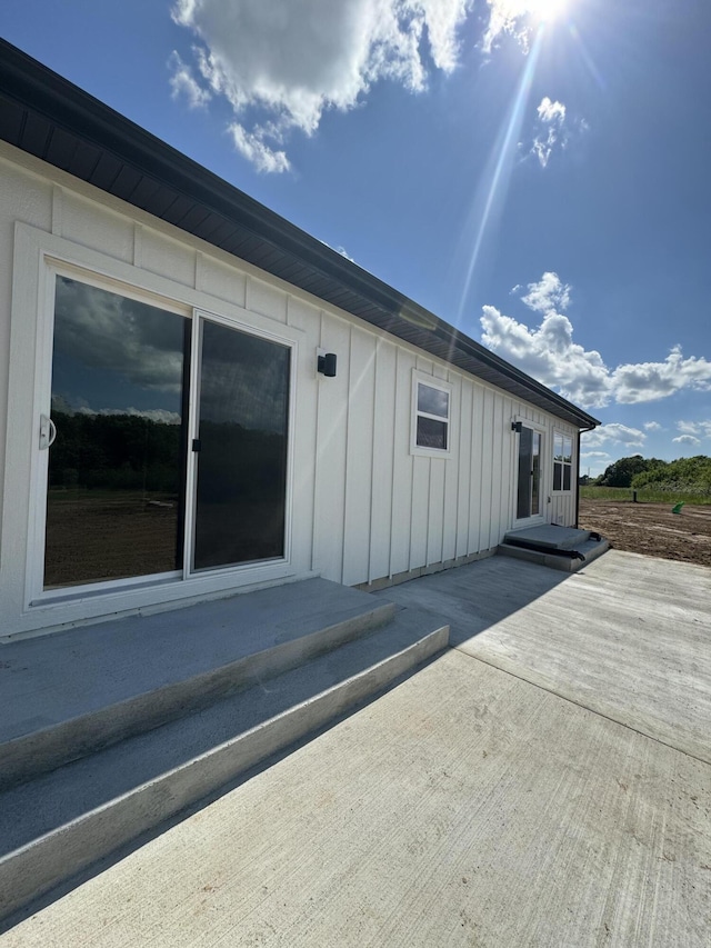 3875 E Dehaven Ln, Fair Grove, MO 65648 - rear view of property featuring board and batten siding