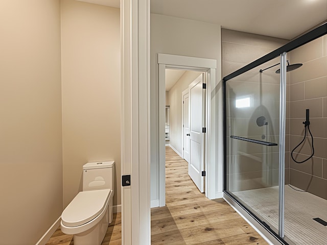 3875 E Dehaven Ln, Fair Grove, MO 65648 - bathroom with a shower stall and wood finished floors