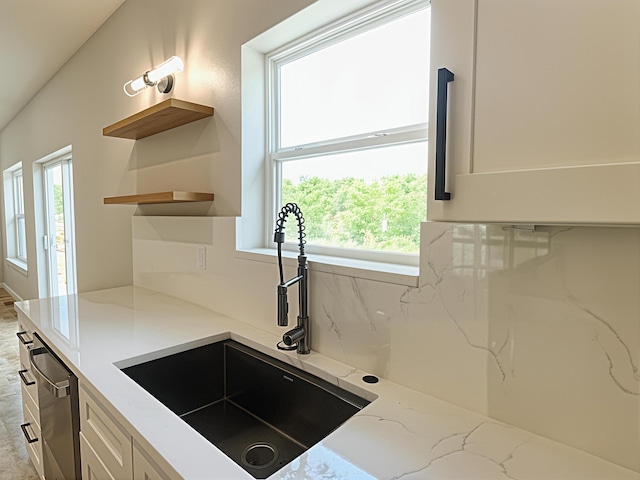 3875 E Dehaven Ln, Fair Grove, MO 65648 - kitchen featuring light stone counters, open shelves, white cabinets, and stainless steel dishwasher