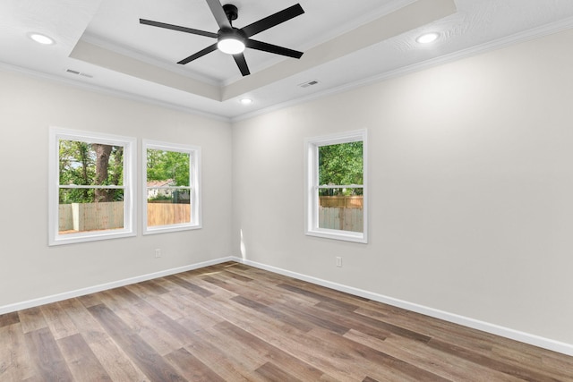 1626 W Lee St, Springfield, MO 65803 - empty room with a raised ceiling, ornamental molding, ceiling fan, and visible vents