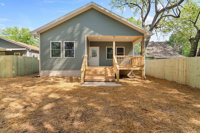 1626 W Lee St, Springfield, MO 65803 - rear view of property featuring a wooden deck and a fenced backyard