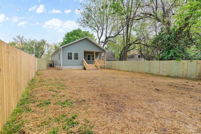 1626 W Lee St, Springfield, MO 65803 - rear view of property featuring a fenced backyard