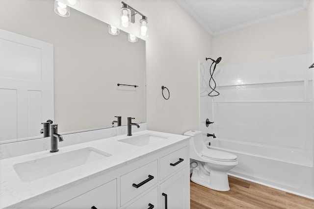 1626 W Lee St, Springfield, MO 65803 - bathroom with a sink, crown molding, toilet, and wood finished floors