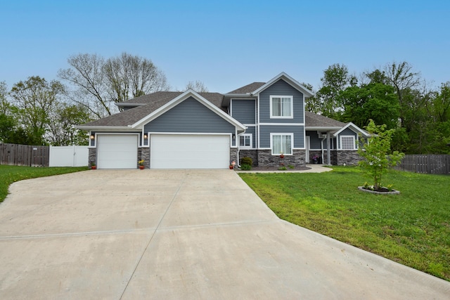 1685 E Vicksburg Psge, Republic, MO 65738 - craftsman-style home featuring a garage, a front yard, stone siding, and concrete driveway