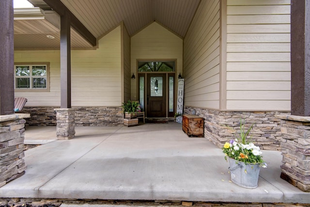 1770 Logan Ridge Rd, Ozark, MO 65721 - property entrance featuring covered porch and stone siding
