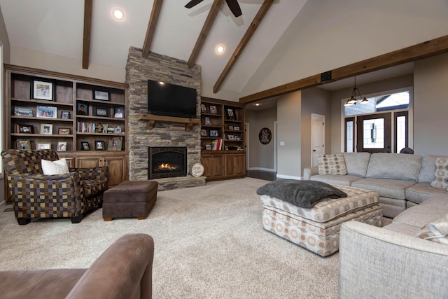 1770 Logan Ridge Rd, Ozark, MO 65721 - carpeted living room with a ceiling fan, a fireplace, beam ceiling, and high vaulted ceiling