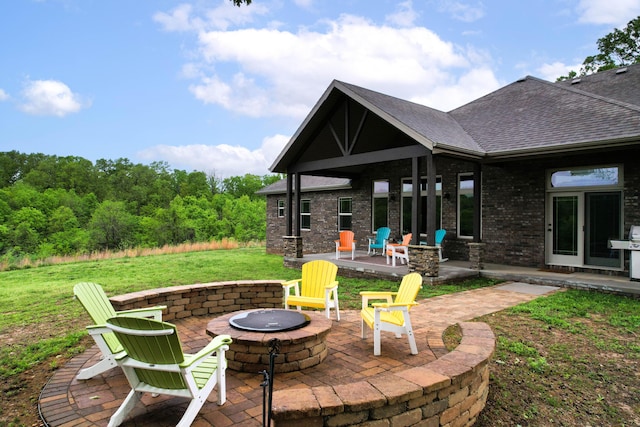 1770 Logan Ridge Rd, Ozark, MO 65721 - view of patio / terrace with a fire pit