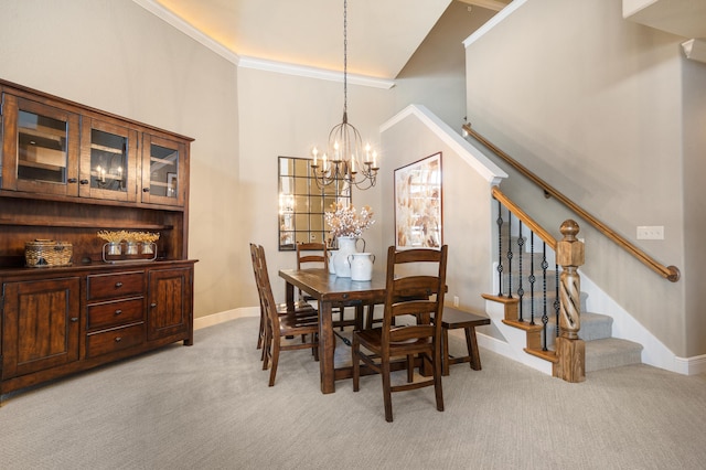dining space featuring stairs, high vaulted ceiling, light colored carpet, and baseboards