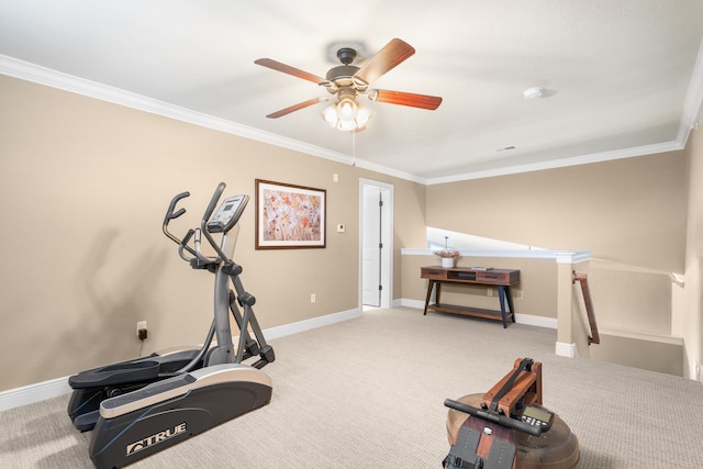 workout room featuring ceiling fan, ornamental molding, baseboards, and carpet