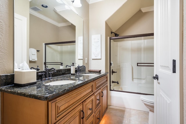 full bathroom with toilet, visible vents, ornamental molding, and a sink