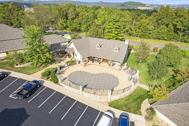 bird's eye view featuring a forest view