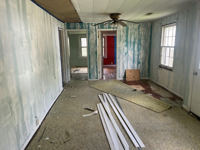 empty room with visible vents and a ceiling fan
