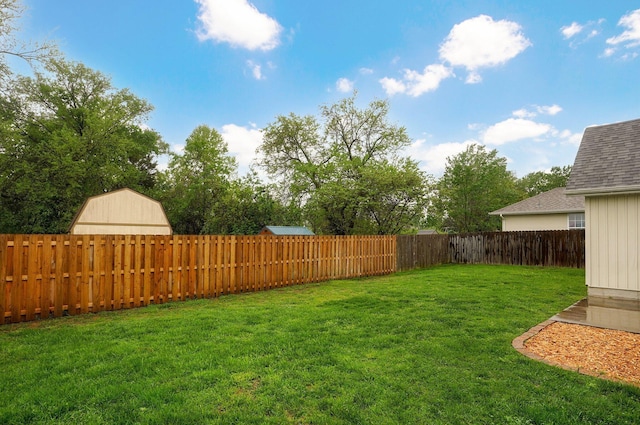 view of yard with a fenced backyard