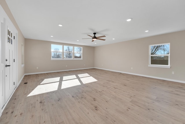 spare room with recessed lighting, ceiling fan, and a healthy amount of sunlight