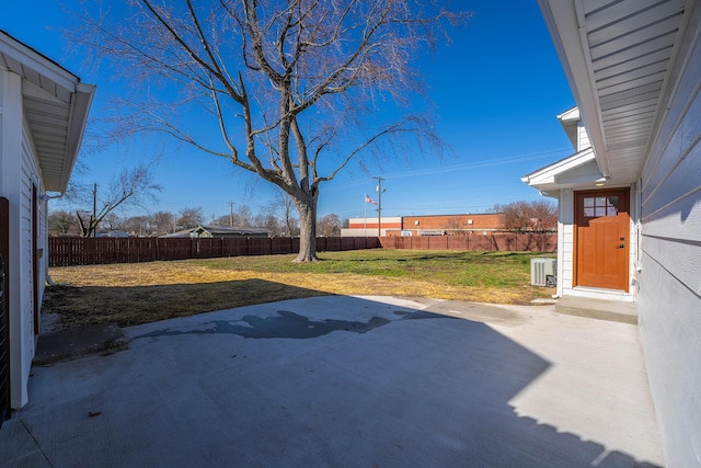 view of yard with a patio and a fenced backyard