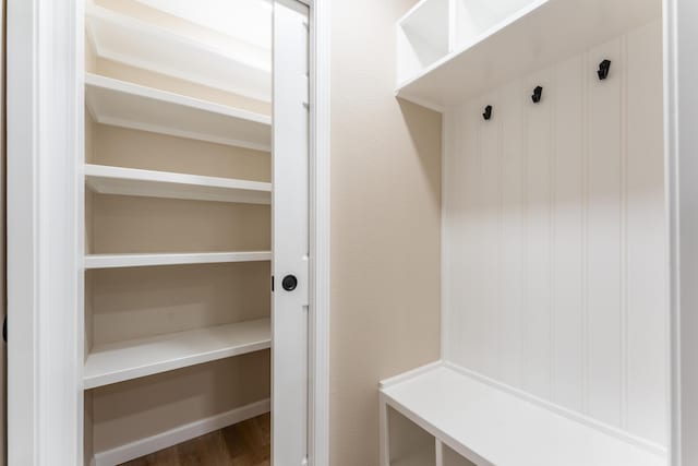 mudroom with wood finished floors