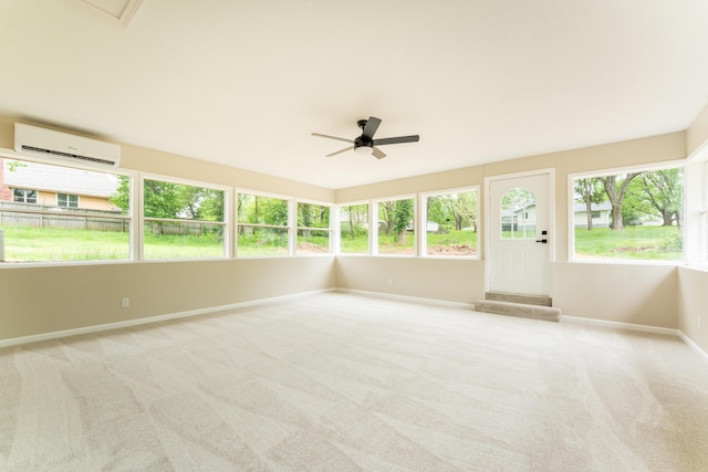 unfurnished sunroom with an AC wall unit