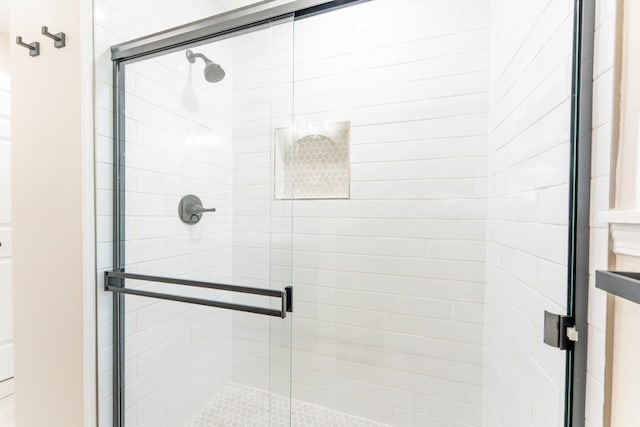 bathroom with a stall shower