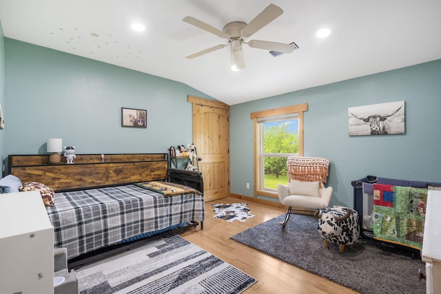 bedroom featuring ceiling fan, recessed lighting, baseboards, wood finished floors, and lofted ceiling