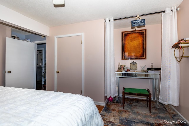bedroom with baseboards