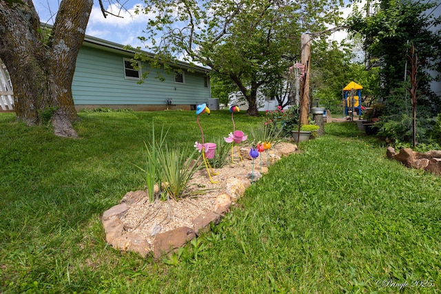 view of yard with a playground