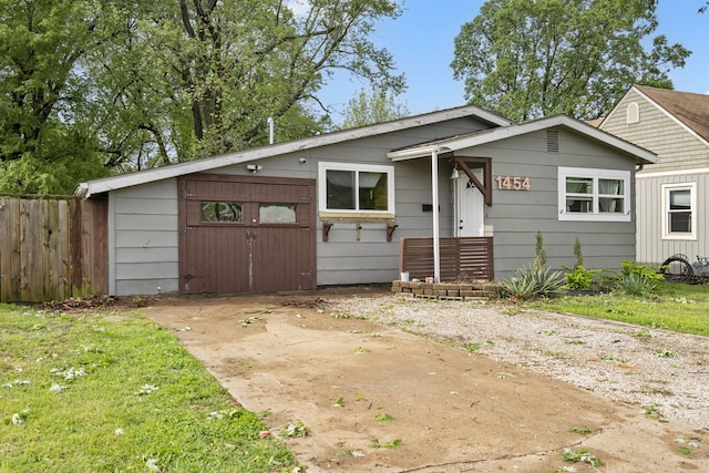view of front of home with fence